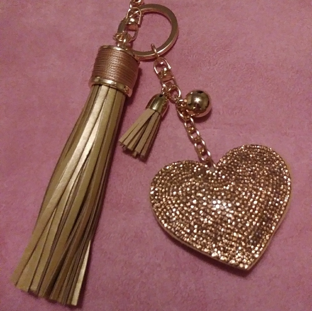 New Beautiful heart. And tassel charm